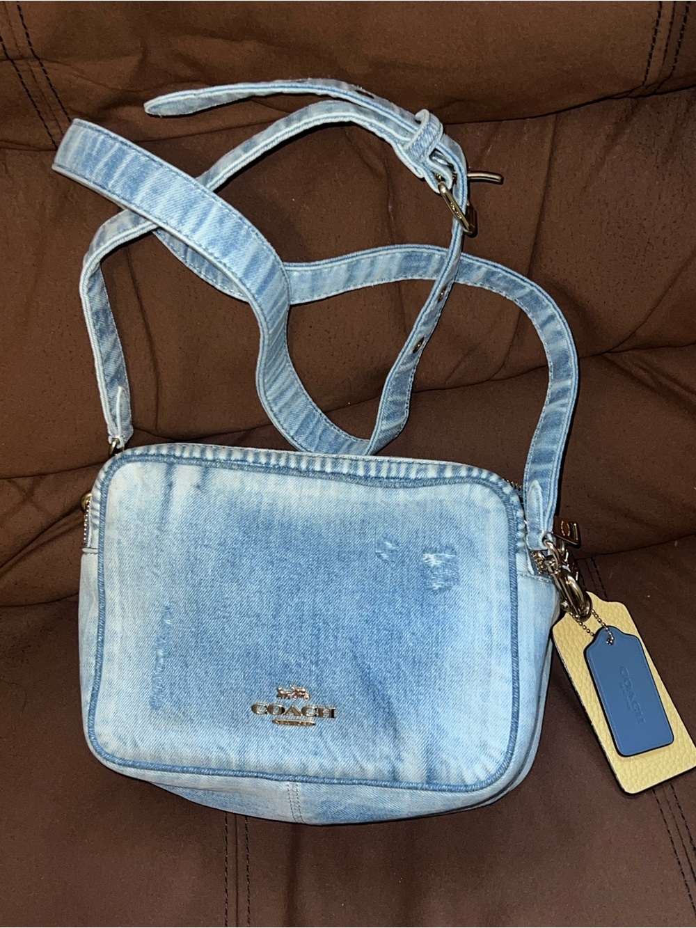 Carey Crossbody Bag
In Loved Denim With Charms